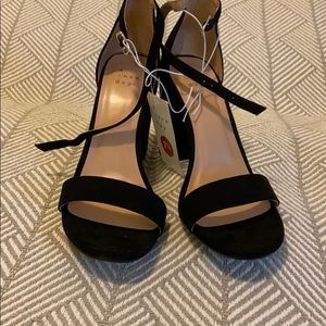 black Heels across the toe strap and ankle strap